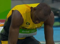 Em estreia, Bolt vence eliminatria com facilidade e avana  semi dos 100