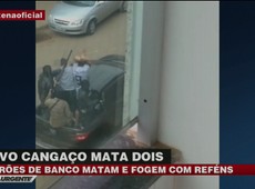 Ladrões de banco matam policial e fogem com reféns