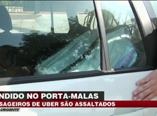 Bandido escondido no porta-malas assalta passageiros de Uber