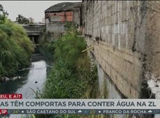 Casas têm comportas para conter enchentes em Itaquera