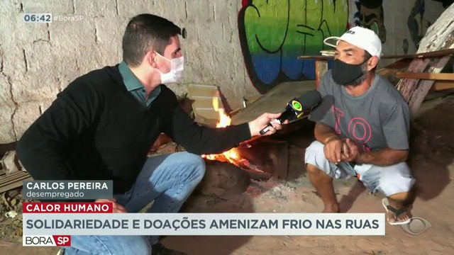 Solidariedade e doações amenizam frio nas ruas Reprodução TV