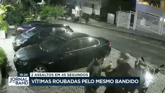 Imagens de câmeras de segurança mostram ação do assaltante Reprodução/Band TV