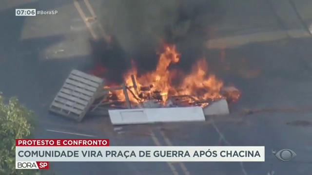 Protesto e confronto em comunidade Reprodução TV