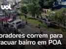 Enchentes no RS: Moradores de bairro em Porto Alegre correm para sair de ca