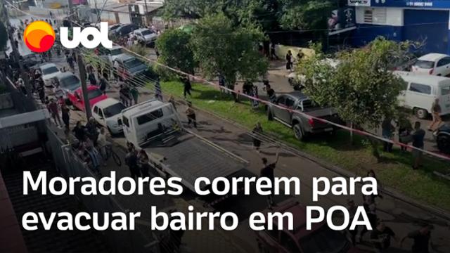 Enchentes no RS: Moradores de bairro em Porto Alegre correm para sair de casa por risco em dique 
