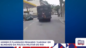 Homem é flagrado pegando 'carona' em blindado da Polícia Militar do Rio