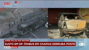 Ônibus em chamas desce avenida movimentada e derruba poste em SP