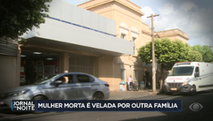 Mulher morta é velada por outra família